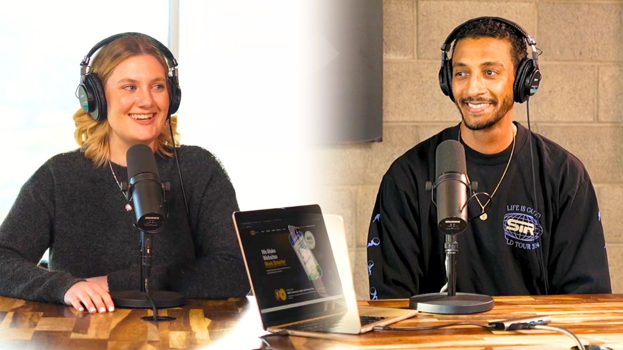 GoldenComm team members smiling at each other at Sunset 17 TV & Podcast Studio